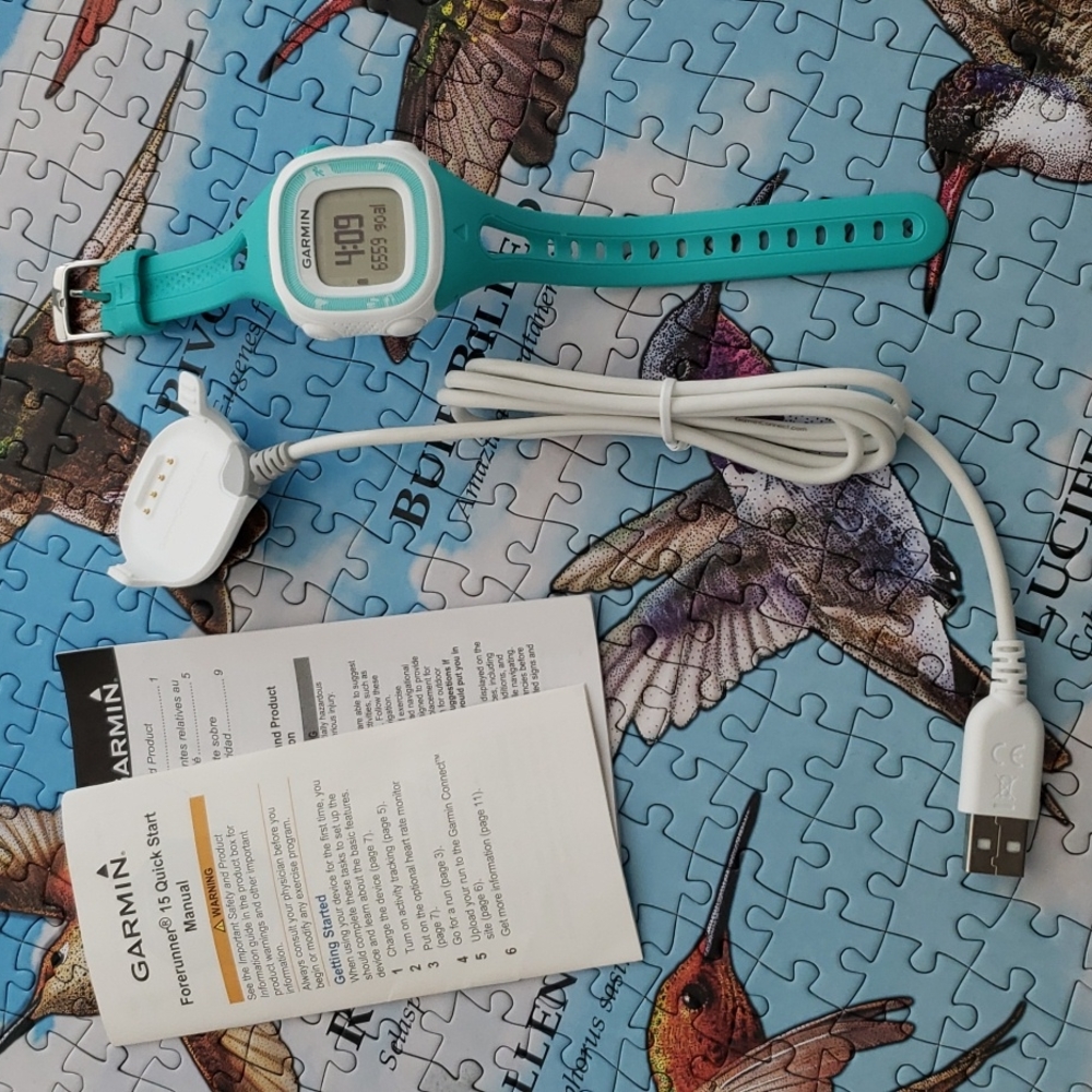 GARMIN FORERUNNER 15 LADIES SMART WATCH LIKE NEW.